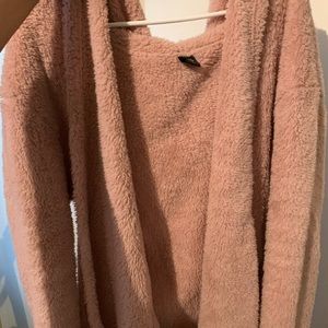 pink fuzzy sweater